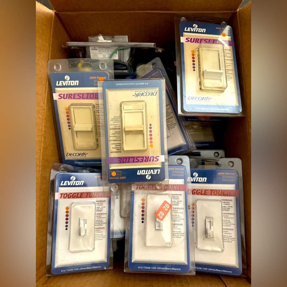 Lot of 36 Leviton Light Switches and Outlets. See Listing For Details.
